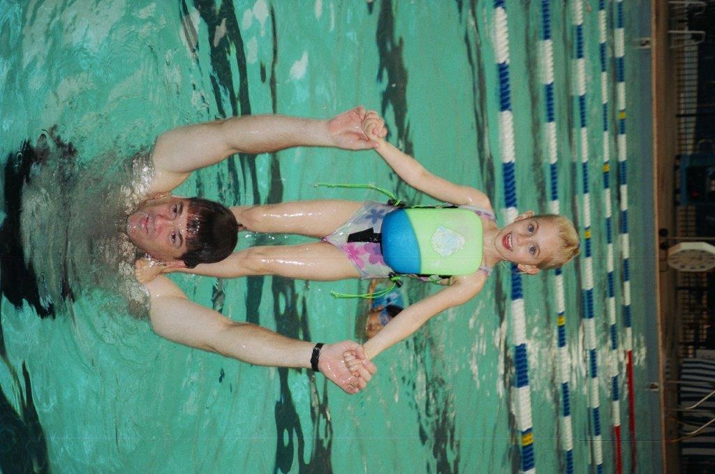 Picture of UG and SJ in a pool in Cary