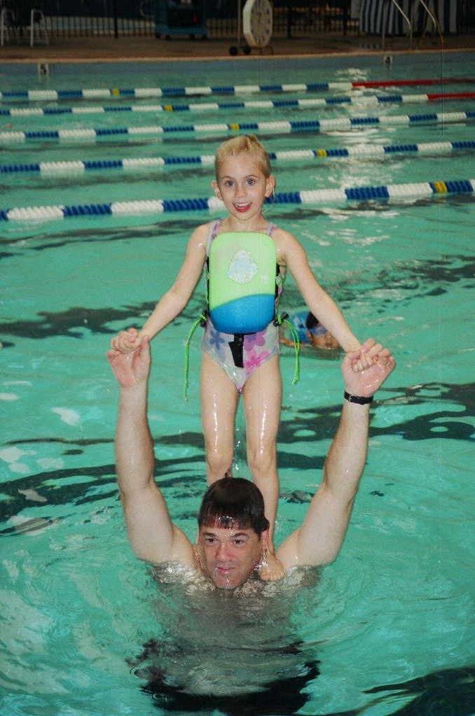 Picture of UG and SJ in a pool in Cary