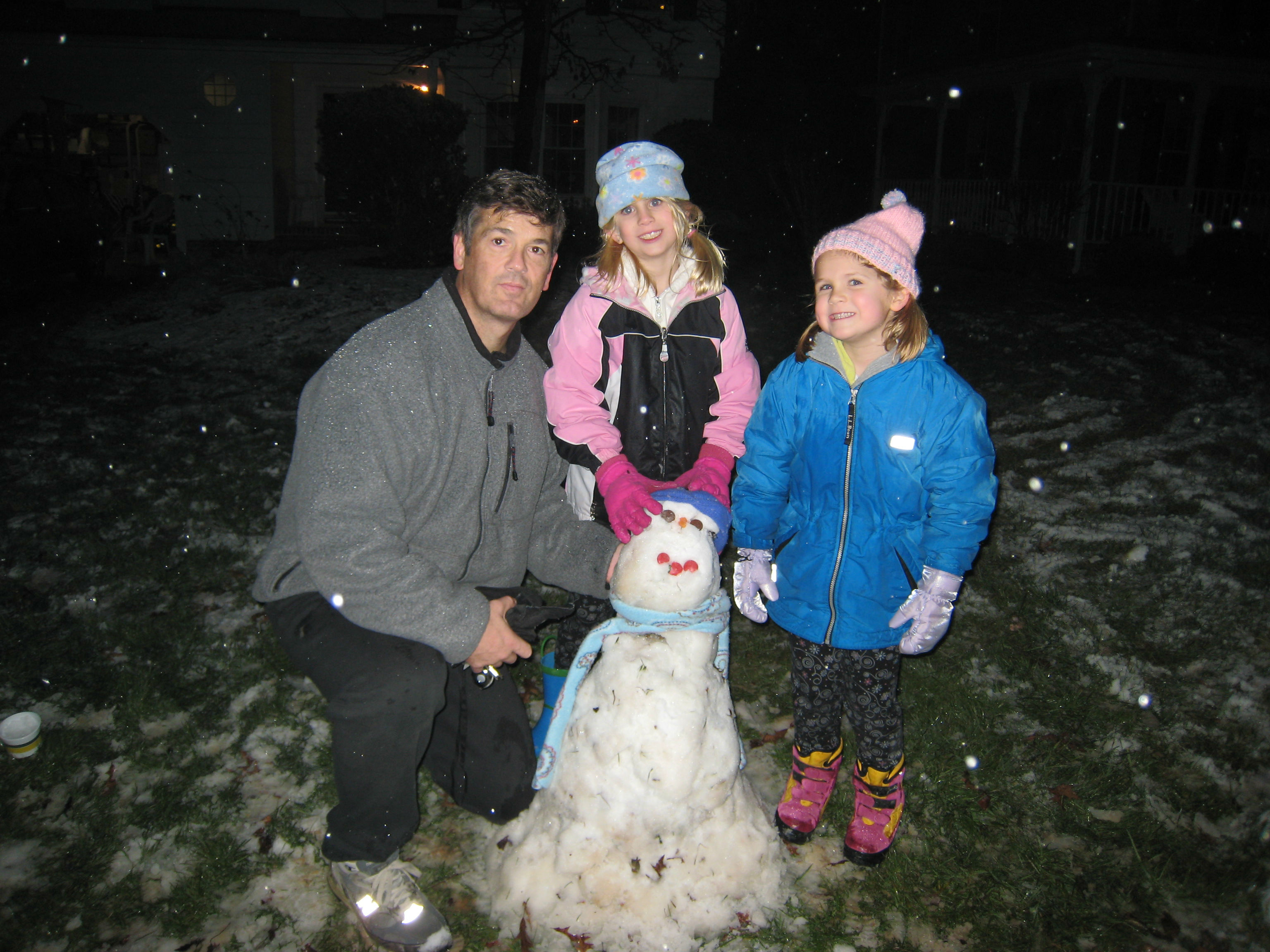Picture of G, SJ and LM with snowman in Cary