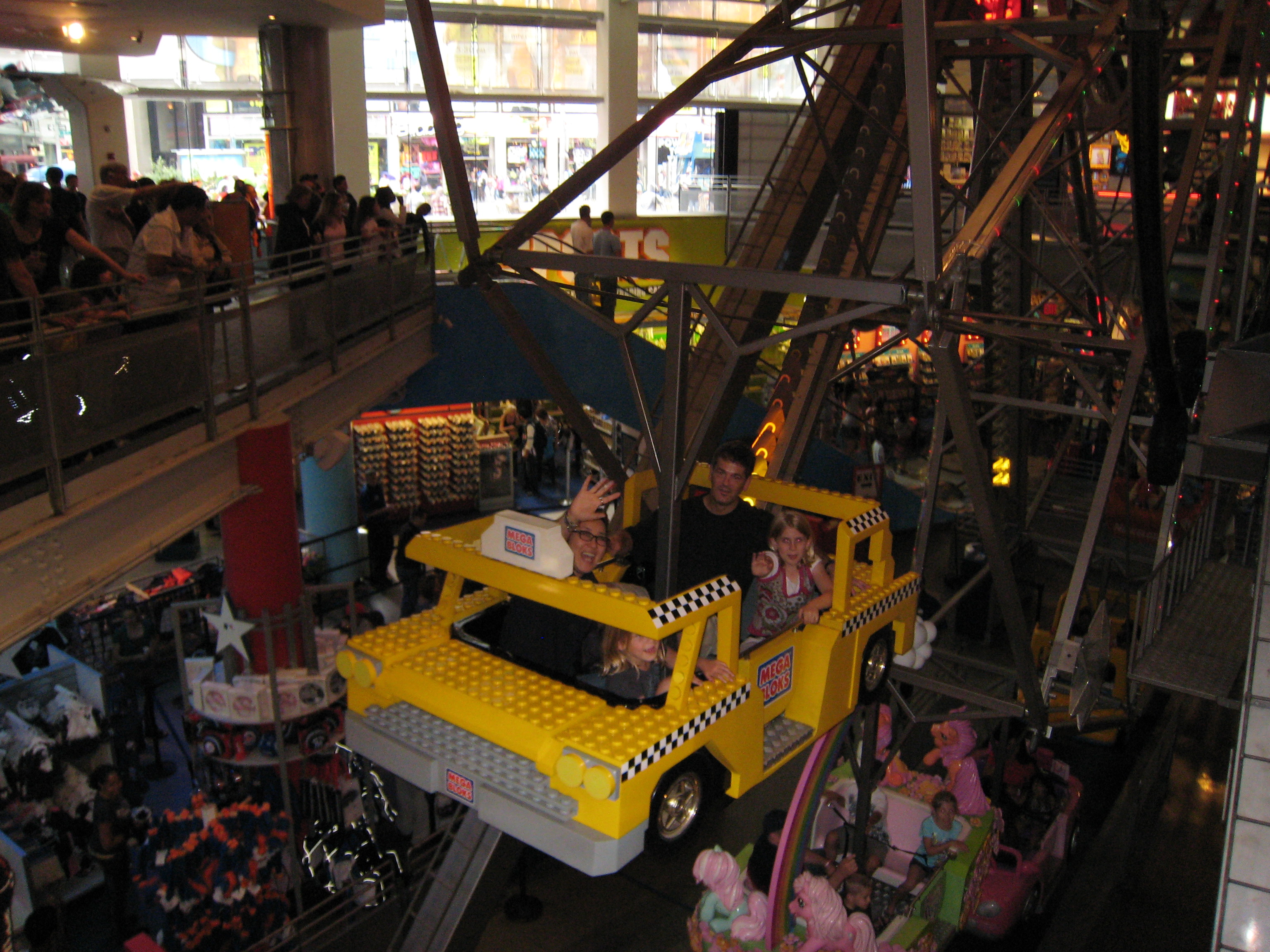 Picture of AS, UG, SJ and LM on a ferris wheel in Times Square