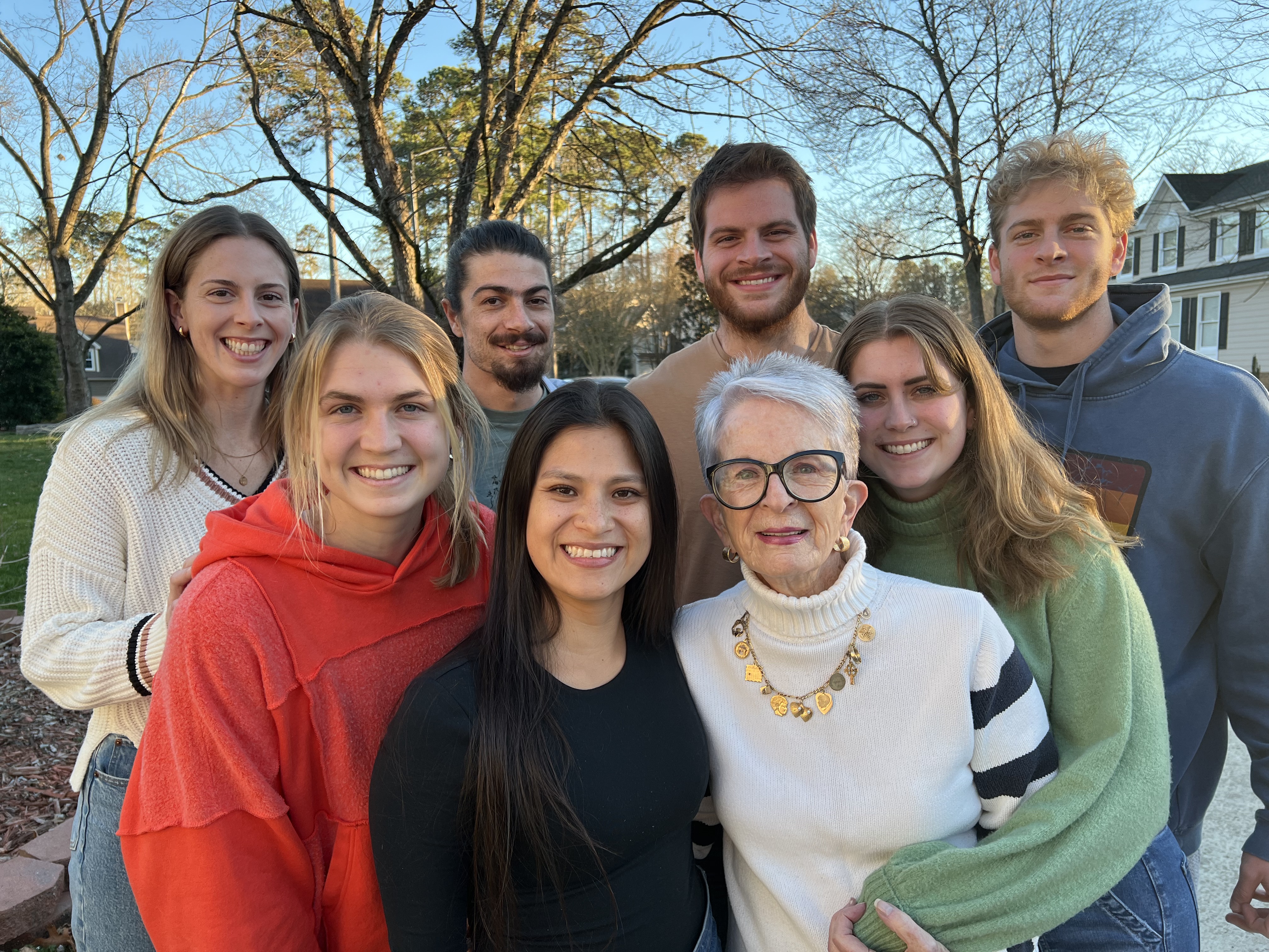 Picture of cousins with grandmother in Cary